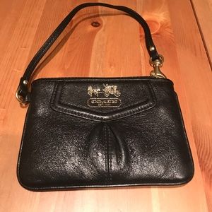 Coach black wristlet. Excellent condition.